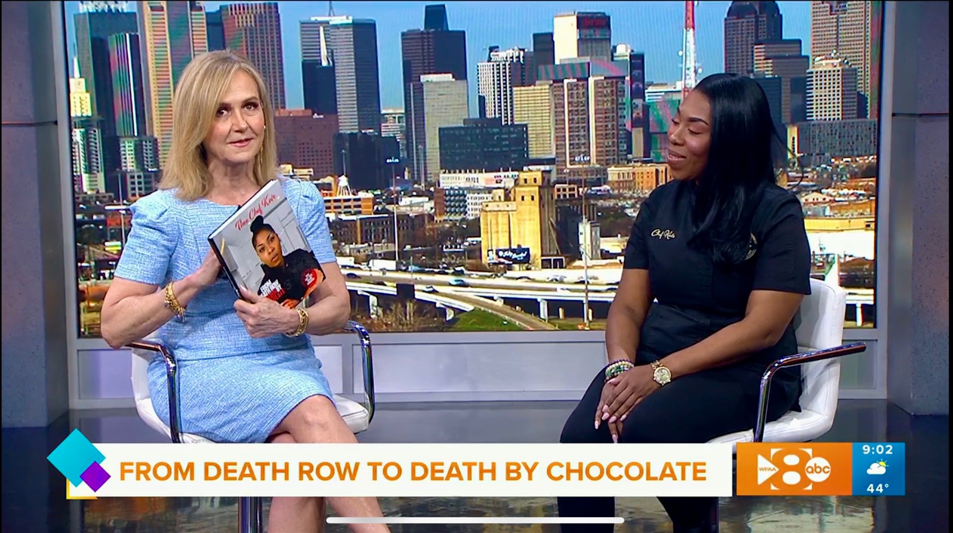 Thee Chef Kate appearing on Good Morning Texas in 2023, holding her cookbook 'From Deathrow to Death by Chocolate' during a televised interview